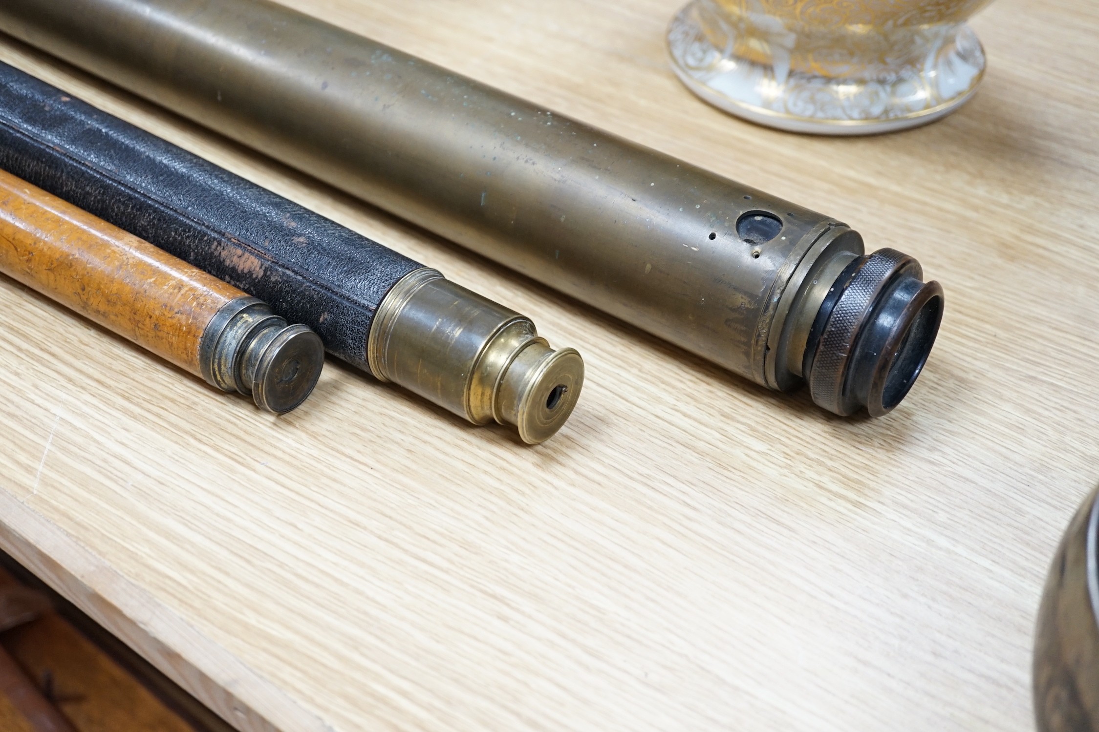 Three telescopes including a Ross, London No. 51257, largest 67.5cm